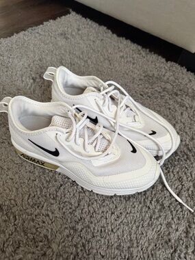 Nike White Mesh Air Max Sneakers with Black Swoosh and Gold Accent